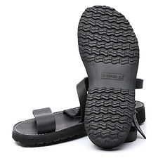 A black Benedictine “Nazarene” style leather Sandal (unisex model).
