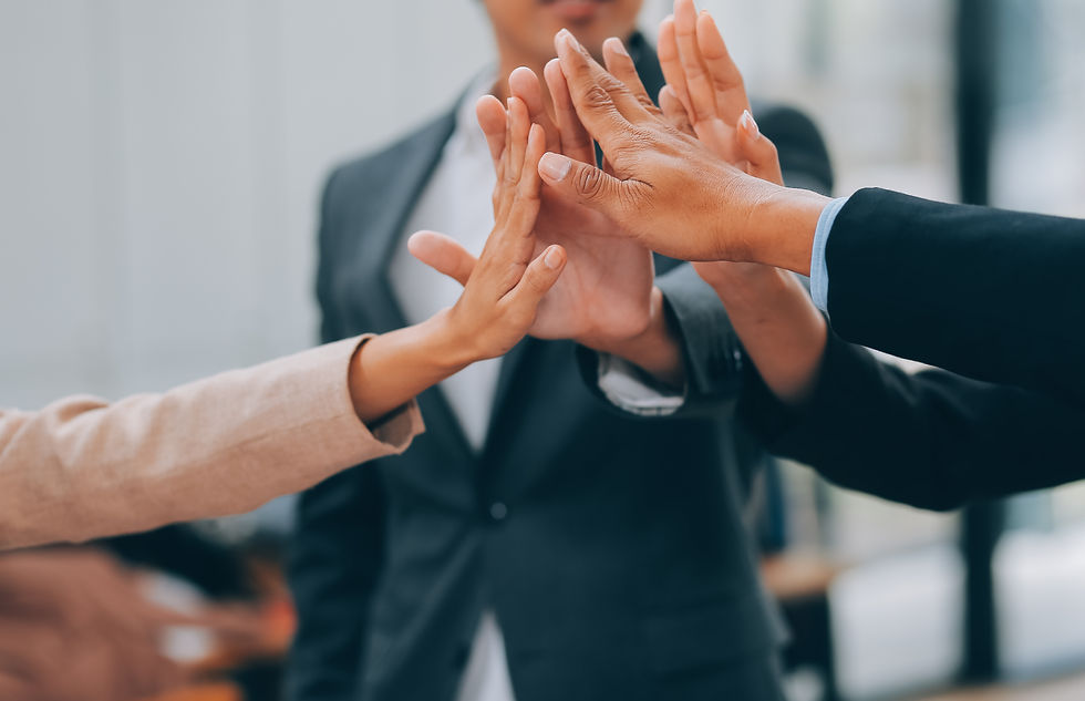 vecteezy_motivated-successful-business-team-giving-high-five-happy_47559985.jpg