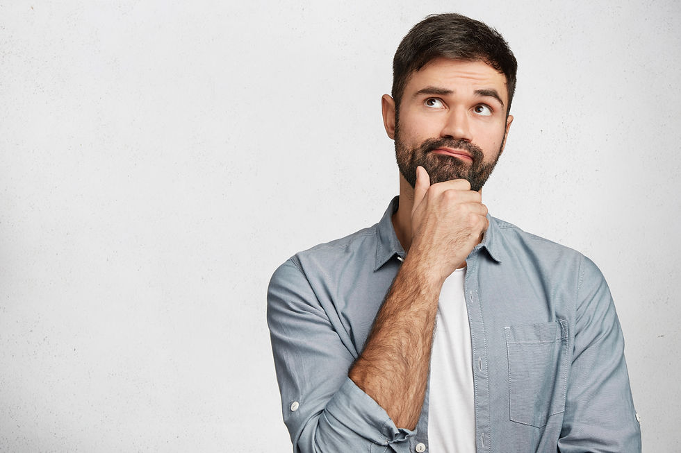 expressive-bearded-man-wearing-shirt.jpg