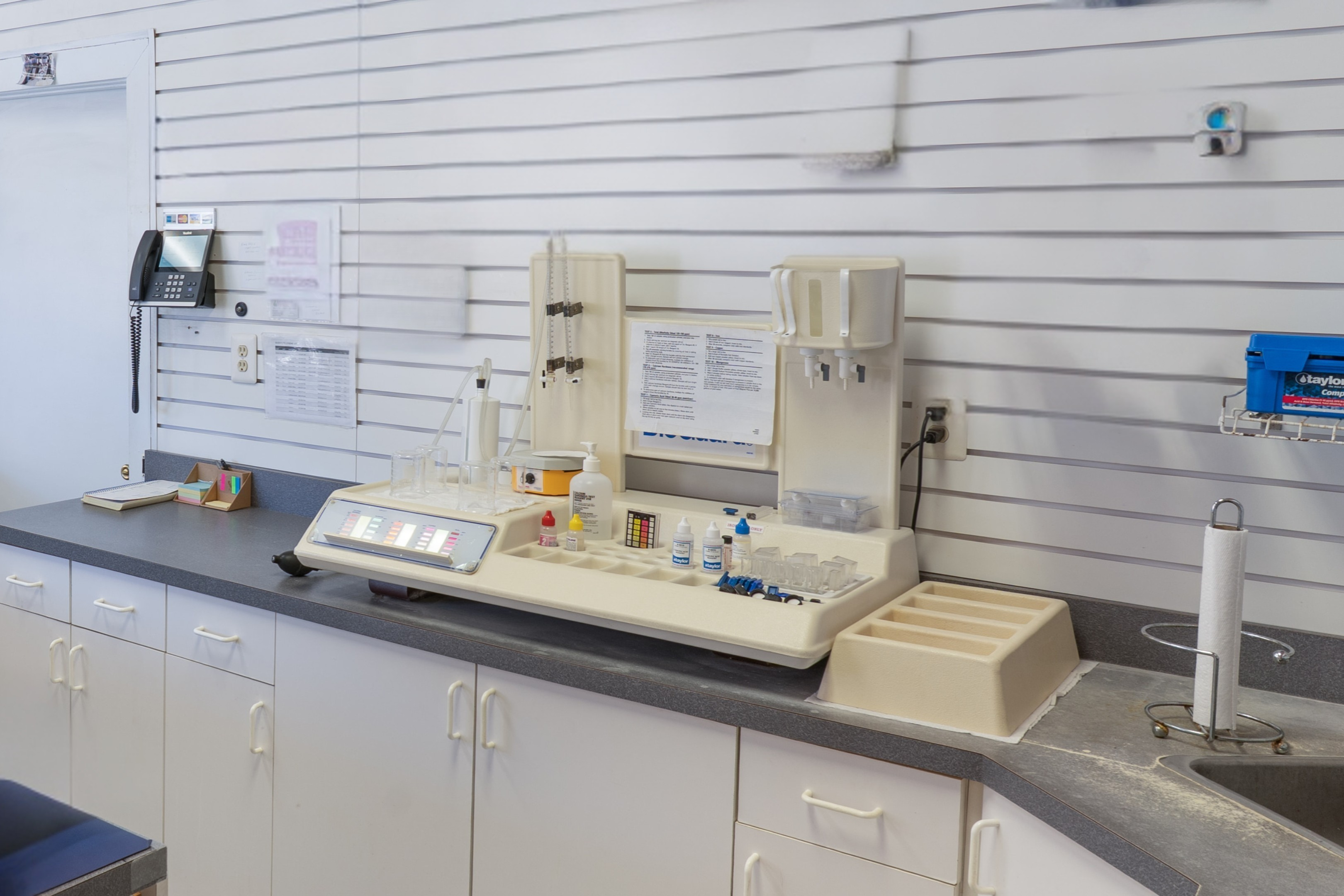Professional pool water testing equipment at Marlboro Pools