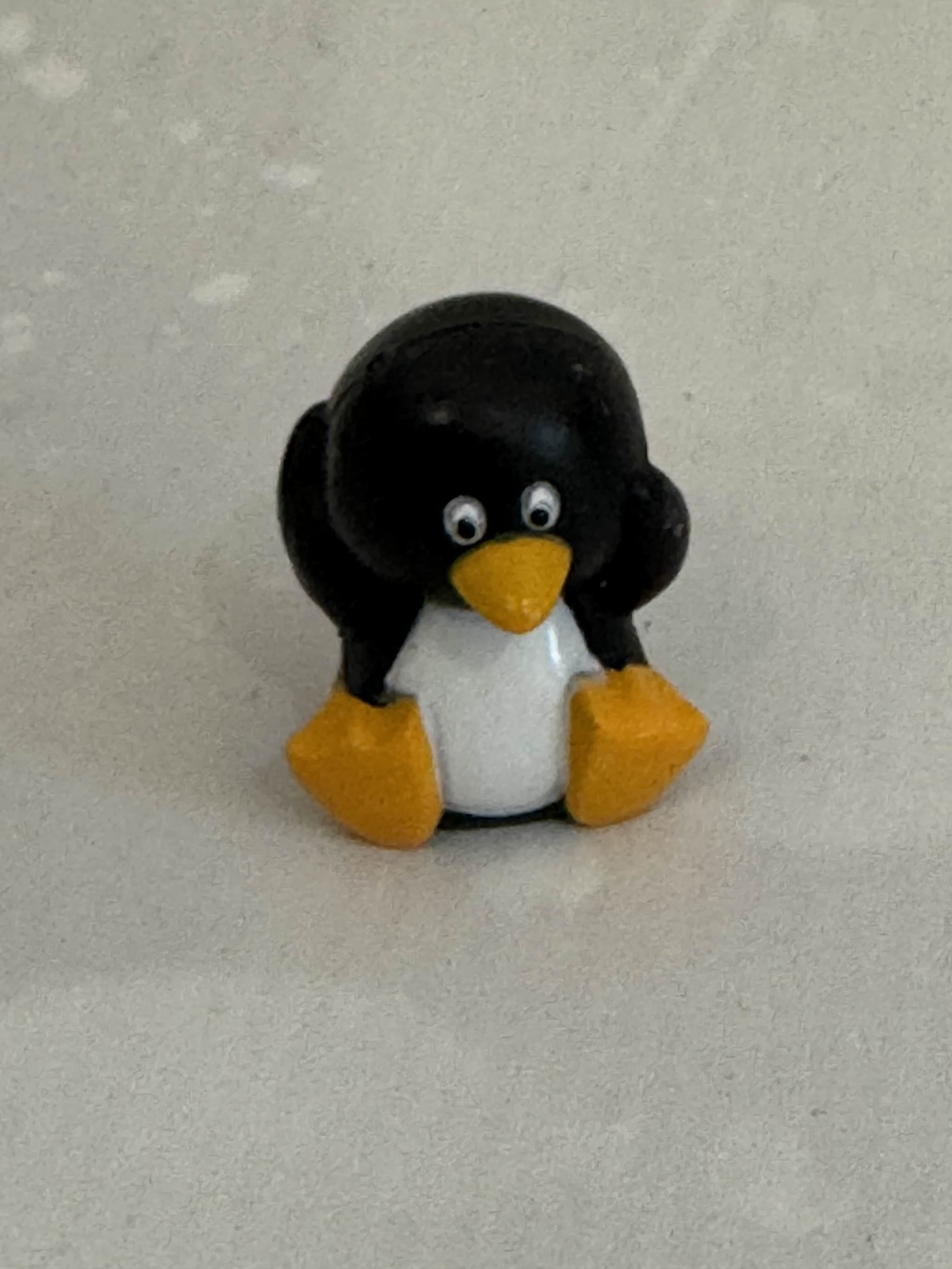 Mini penguin topper