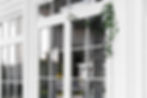decorated-front-door-with-plant.jpg