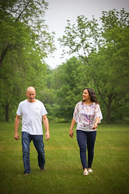 Rory Londer and Sweta Patel are walking and talking side-by-side.