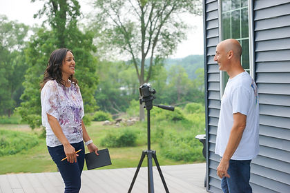 Sweta Patel is about to film Rory Londer during an interview.