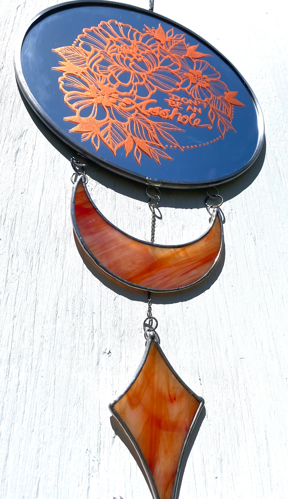 Thumbnail: Copper “Don’t be an Asshole” mirror + orange moon and star