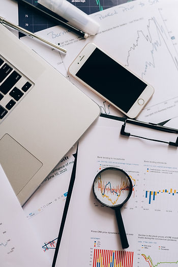 Data Sheets with a laptop and iphone