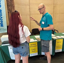 Grant in front of information table.jpeg