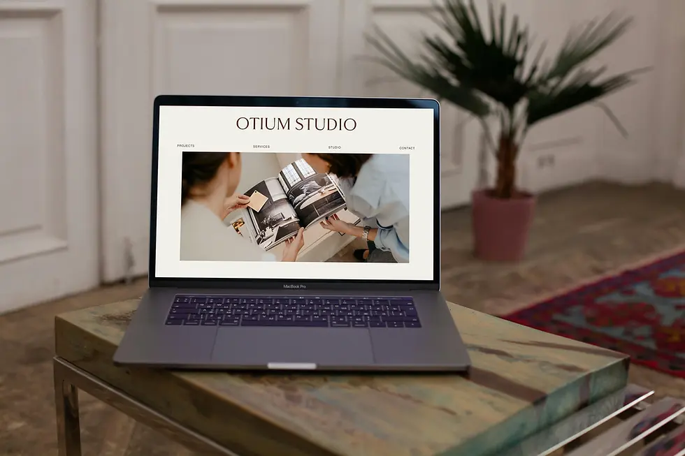 Laptop with OTIUM STUDIO website showing people reading