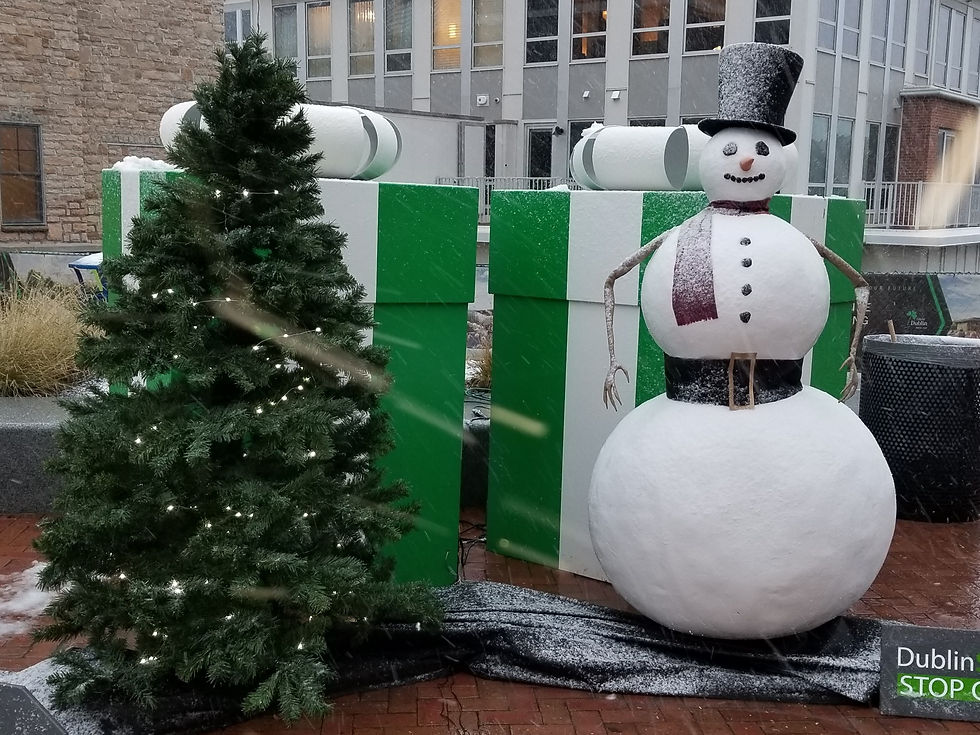 Custom large scale animatronic snowman and animated Christmas tree holiday installation for City of 