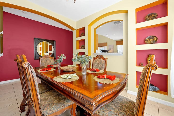Carved dining table set for dinner