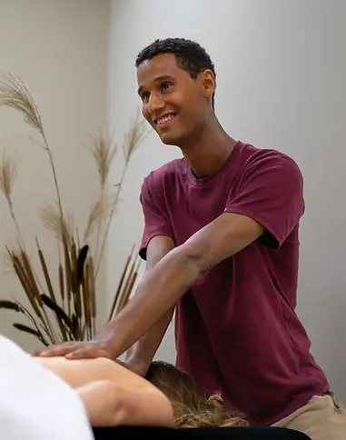 Ken Darko giving a treatment of holistic physiotherapy