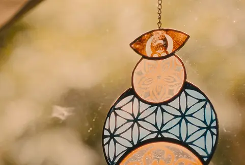 close up of a spiritual window decoration