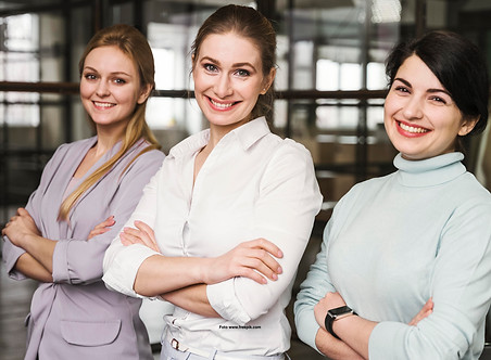 portrait-three-businesswomen-indoors.jpg