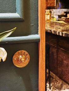 Hidden entrance concealed behind a vintage mirror at 60ml by Asador Singapore
