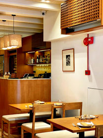 Contemporary restaurant environment integrated within Duxton Road shophouse setting