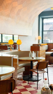 Spatial flow between dining, bar and waterfront hospitality environments