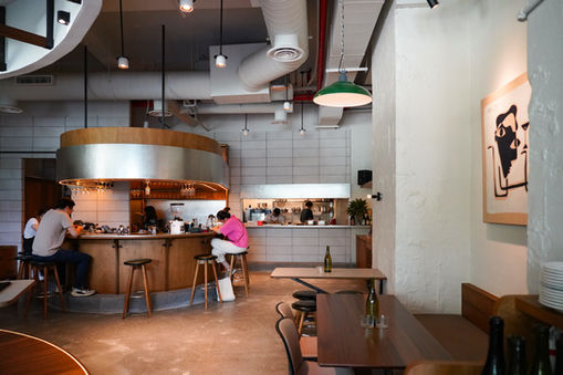 Layered ambient lighting creating warmth and atmosphere throughout the space