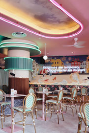 Tropical-inspired dining environment shaped by resort and vacation experiences