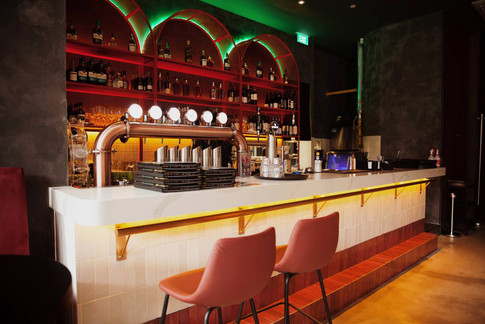 Dynamic spatial experience shaped by neon lighting and urban influences 