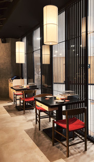 Contemporary Japanese detailing and warm material finishes within hospitality environment
