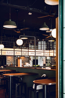 Contemporary hospitality space balancing dining, drinking and community gathering
