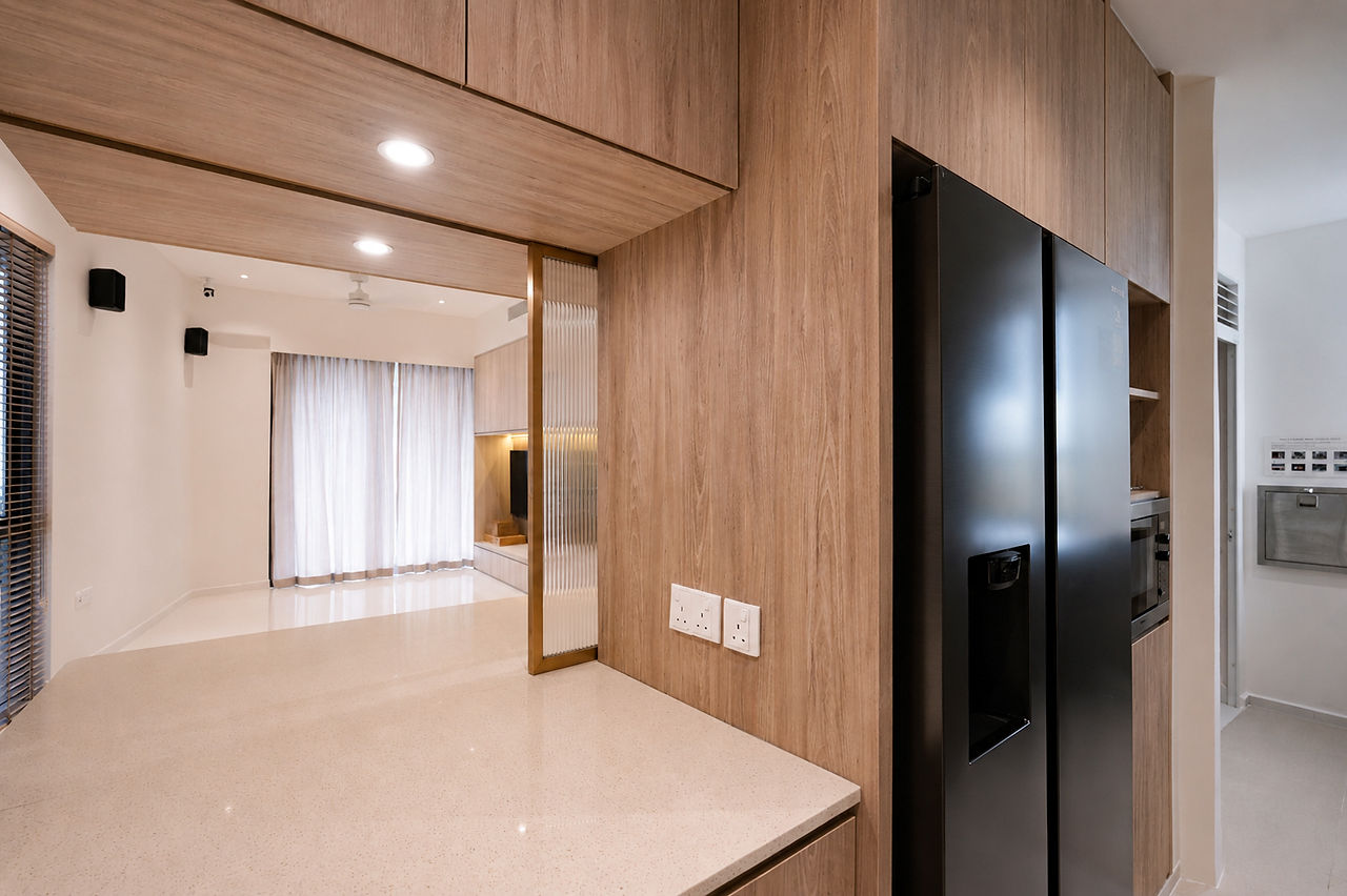 White interiors complemented by natural wood textures and refined brass accents