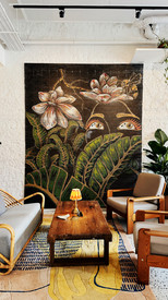 Spatial flow between dining areas and tropical outdoor surroundings