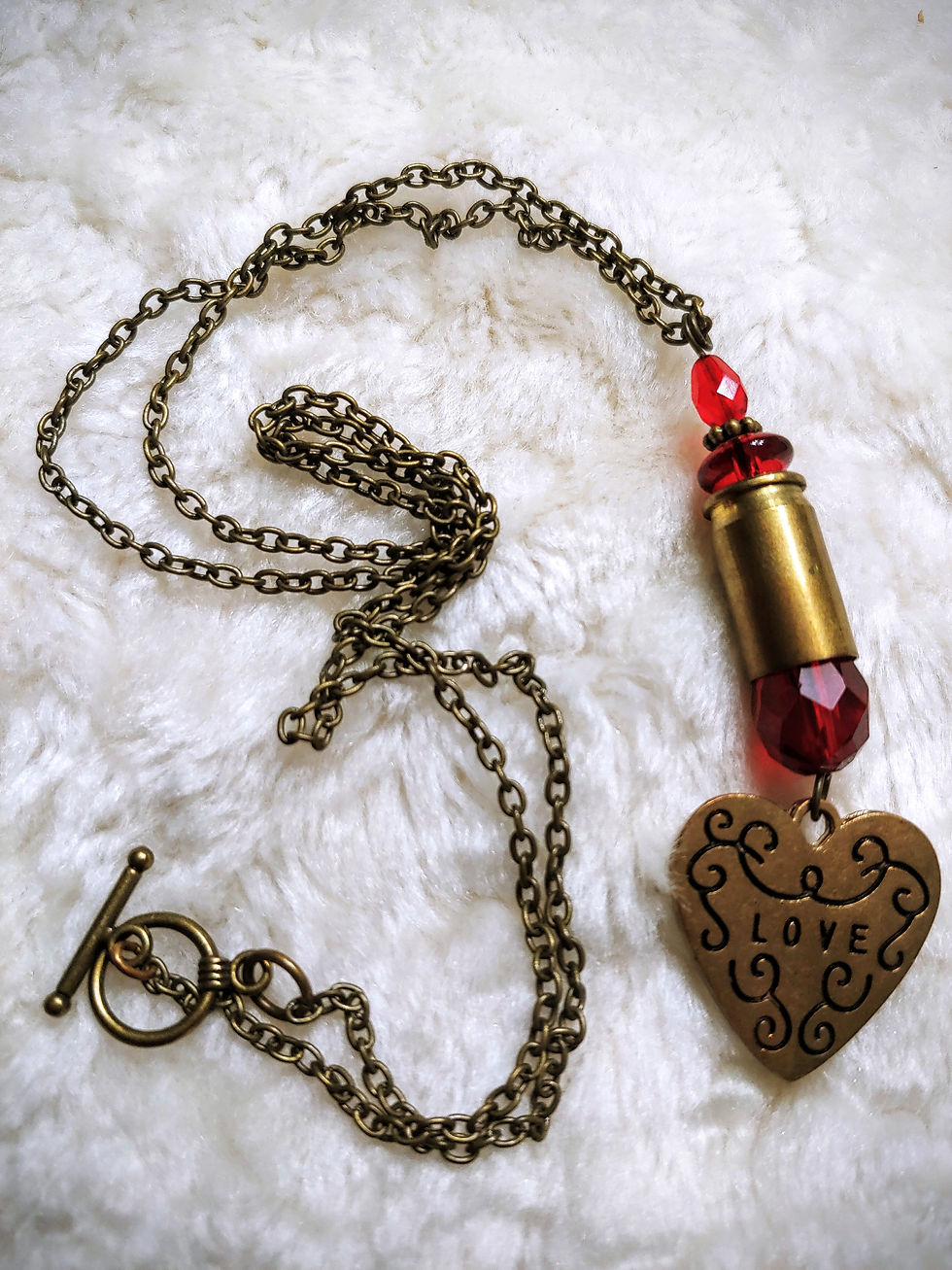 Thumbnail: Brass Heart With Bullet Necklace