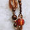 Thumbnail: Copper & Burgundy Lariat Style Necklace