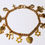 Thumbnail: Gold Spiritual Charm Bracelet