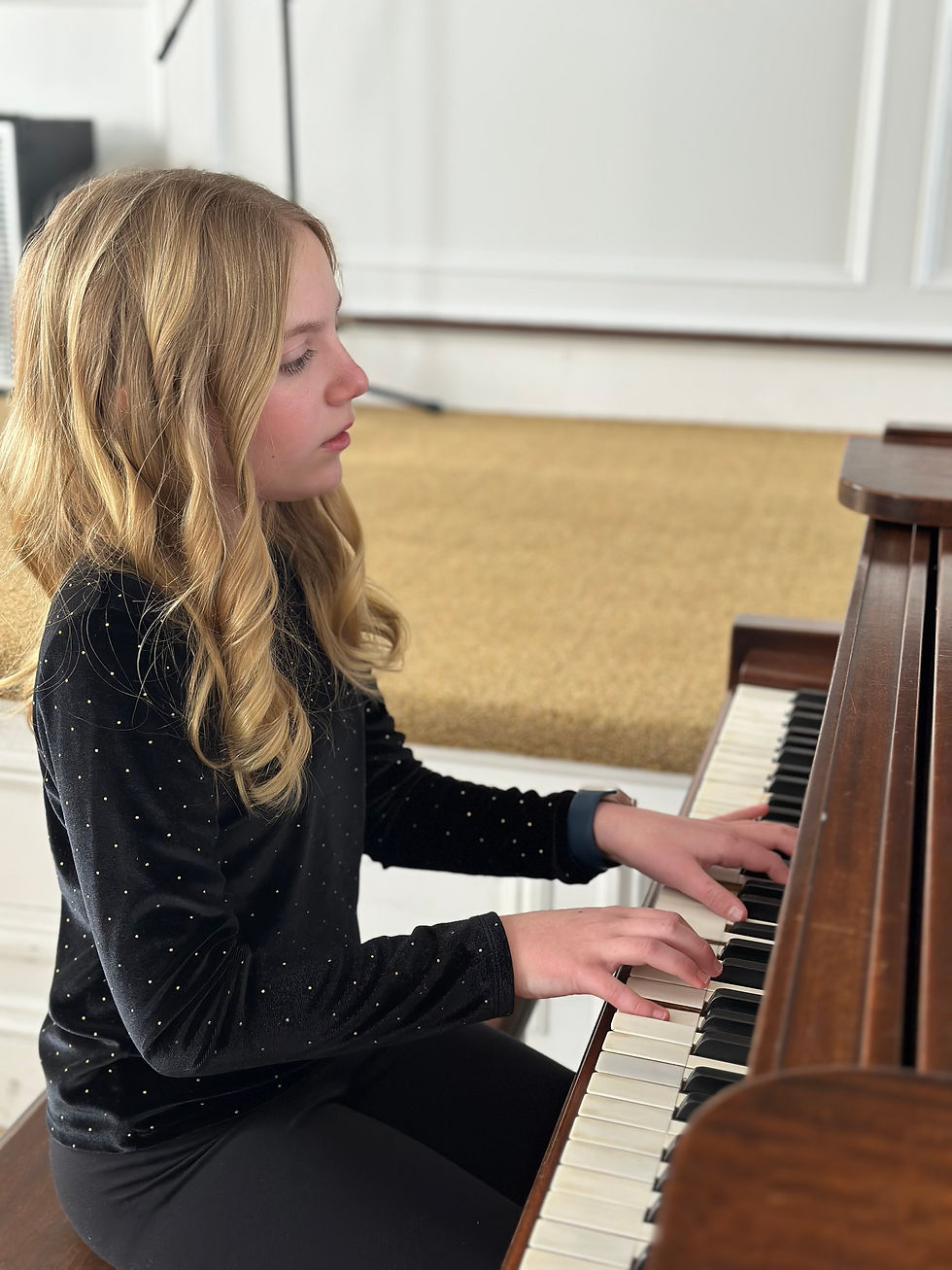 Emmeline Burkhart showcases her piano technique