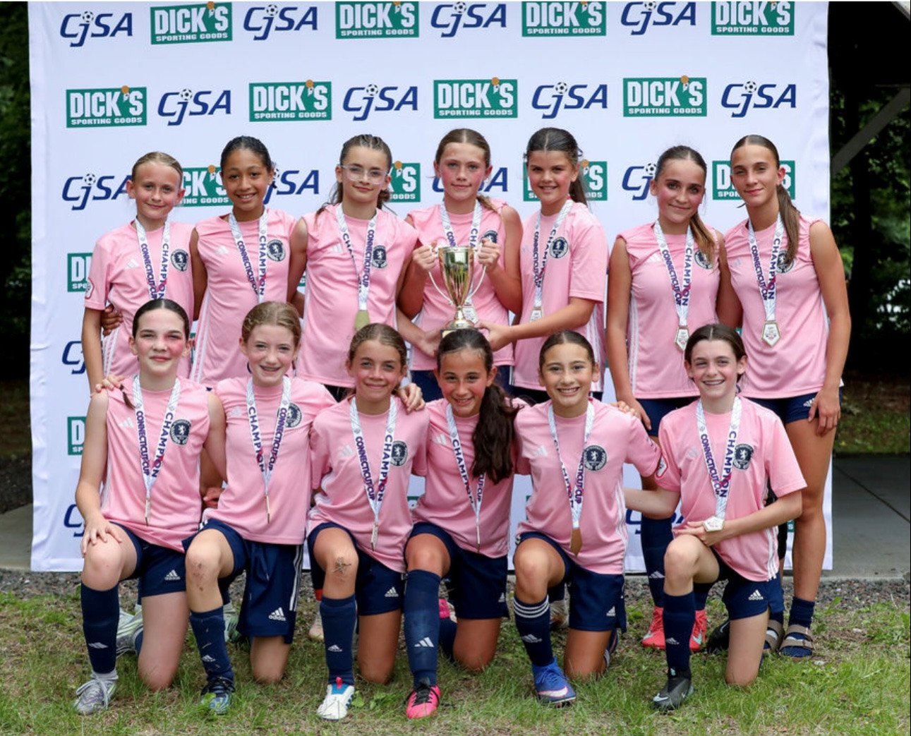 The victors pose with their medals and trophy. (submitted)