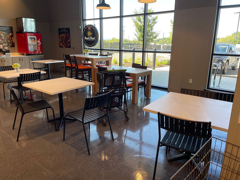 Shoppers who select sandwiches or ready-to-eat meals can dine in a well-lit café area.