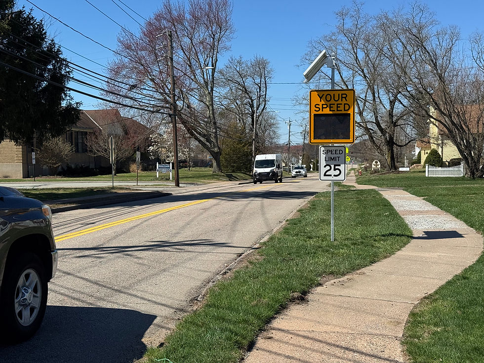 Plans by the Main St. Group include flashing lights, a raised crosswalk and crossing guard in front of Naubuc School. (Marteka)