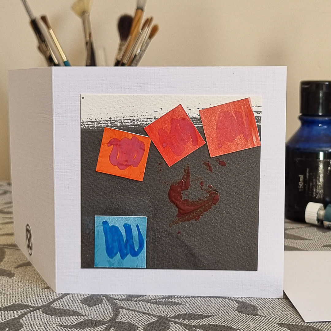 Three Red Squares Greetings Card