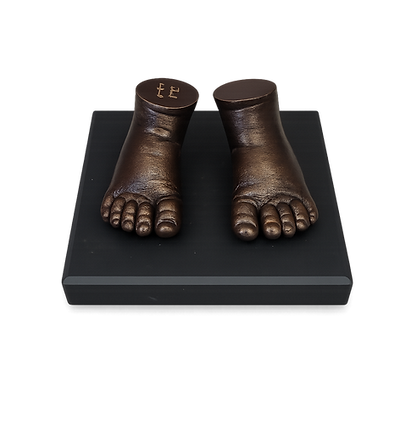 Bronze baby ffet cast on slate