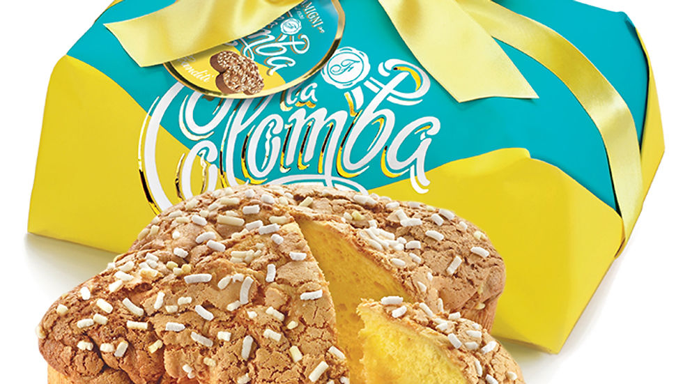 Yellow-blue packaged Italian cake with a yellow bow. This Colomba cake cake is almond-topped and sliced, showing a soft, yellow interior. "La Colomba." By IFM gourmet Dubai, UAE.
