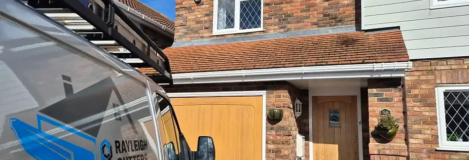 Rayleigh Gutter Cleaning & Repairs van outside a customer property in Essex