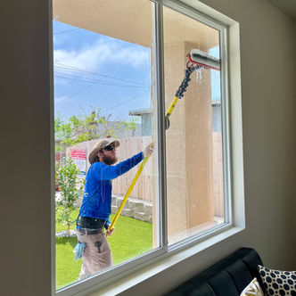 Professional window and screen cleaning for residential and commercial properties in San Diego by Nomadic Home Services, providing streak-free clarity and restored curb appeal.