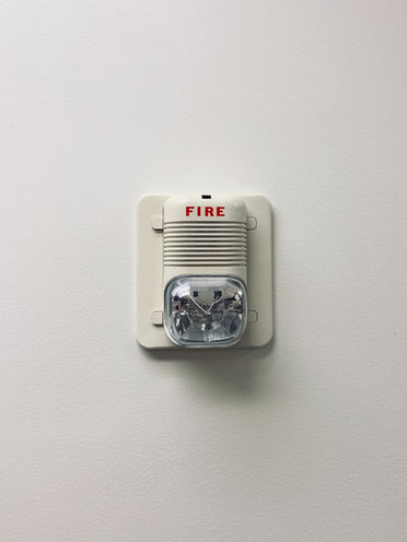 Who Can I Sue if My New York House Burns Down Due to a Faulty Fire Alarm?