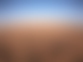 Aerial view of Arabian Desert dunes from hot air balloon in Dubai