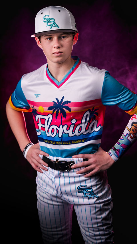 Creative sports photographer Alexander Martin using fire, smoke, and water to create stunning sports portraits in Okemos Mi.