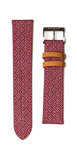 a watch strap with a premium woven fabric top and leather lining and keepers