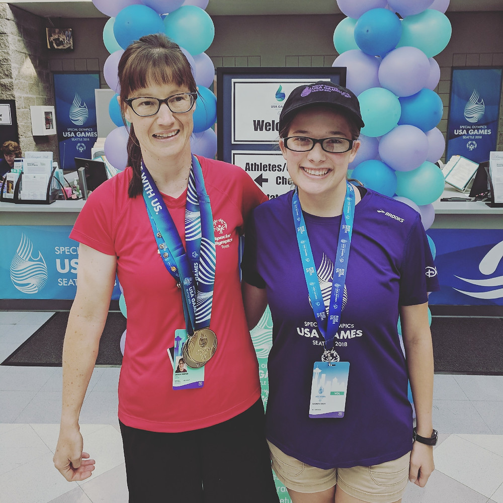 Special Olympics Swim Coach Lauren Bach with one of her Special Olympians