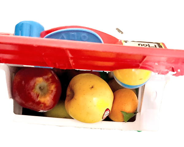 Play house with hinged roof and light switch filled with fruit