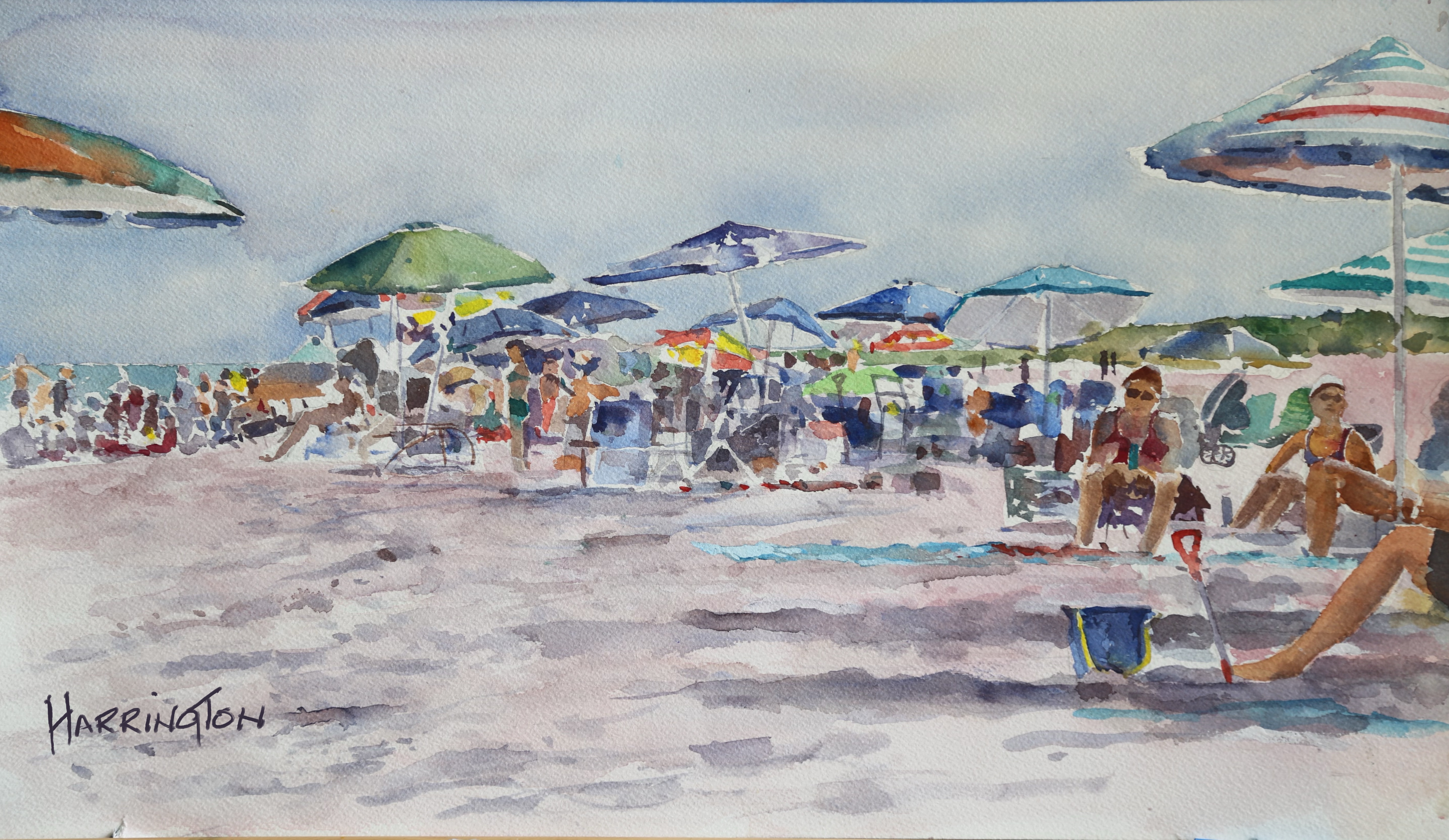Watercolor painting of the view down a beach at eye-level featuring colorful umbrellas and relaxed beach goers.