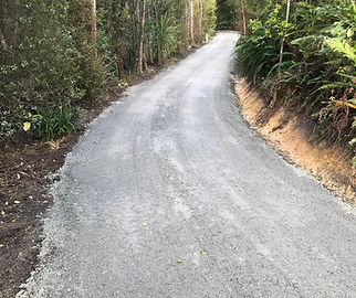 Regrade and compacted a metal/lime mix on this driveway in Wainui