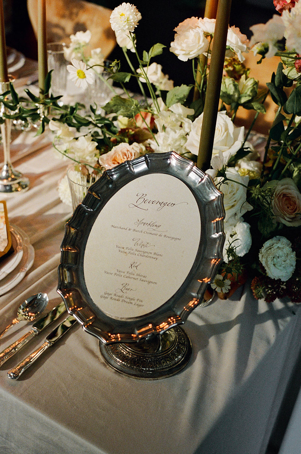 Close-up of wedding table details with layered textures and understated luxury styling