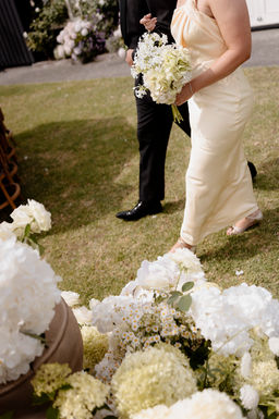 Yellow bridesmaid dress and flowers
