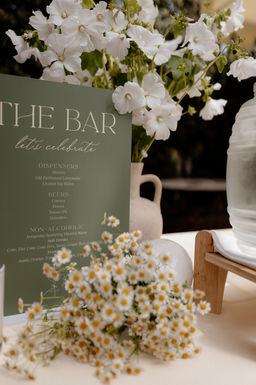 Wedding bar menu with floral styling